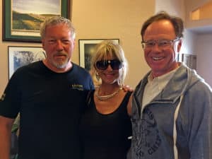 Motorcycle artist A.D. Cook, artist Beti Kristof and Woody, president Buffalo Chip